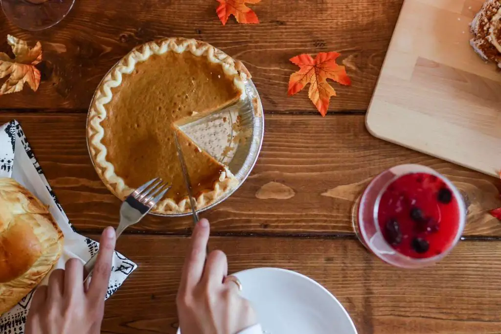 Enjoying your cocktails for thanksgiving with a pumpkin pie.