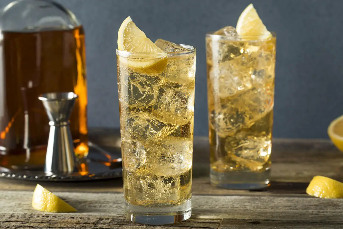 Presbyterian cocktail in highball glass with ice and lemons